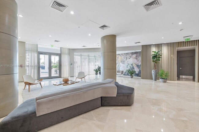 Building Photo - 10275 Collins Ave