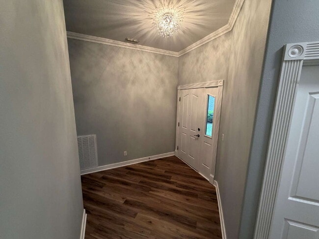 Building Photo - Elegant, Low Maintenance Townhome Designed for Elevated Everyday Living!