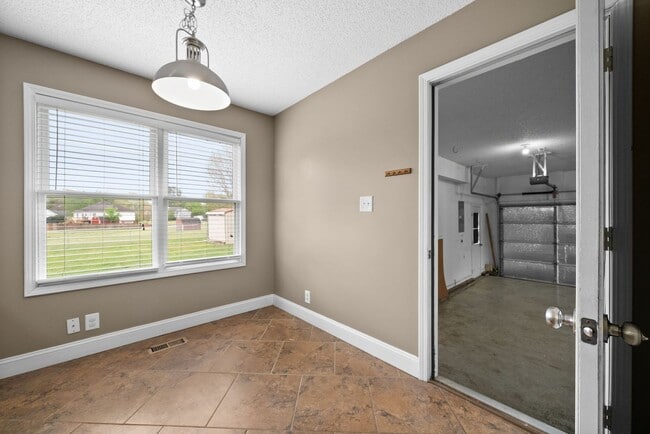 Building Photo - Pet-Friendly 3BR Home w/ 3-Car Garage, Fir...