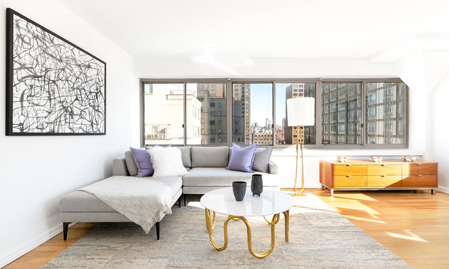 photo of 201 East 69th St Model Apartment PHS living room staged with modern furniture - The Fairfax