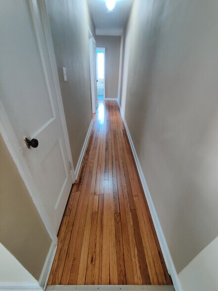 Hallway from kitchen to bedrooms and bath (main floor)) - 4733 France Ave S