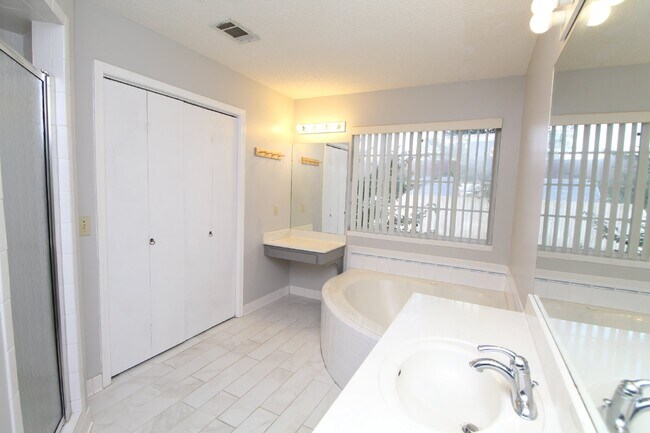 Building Photo - Pool Home with Office, Two Primary Suites ...