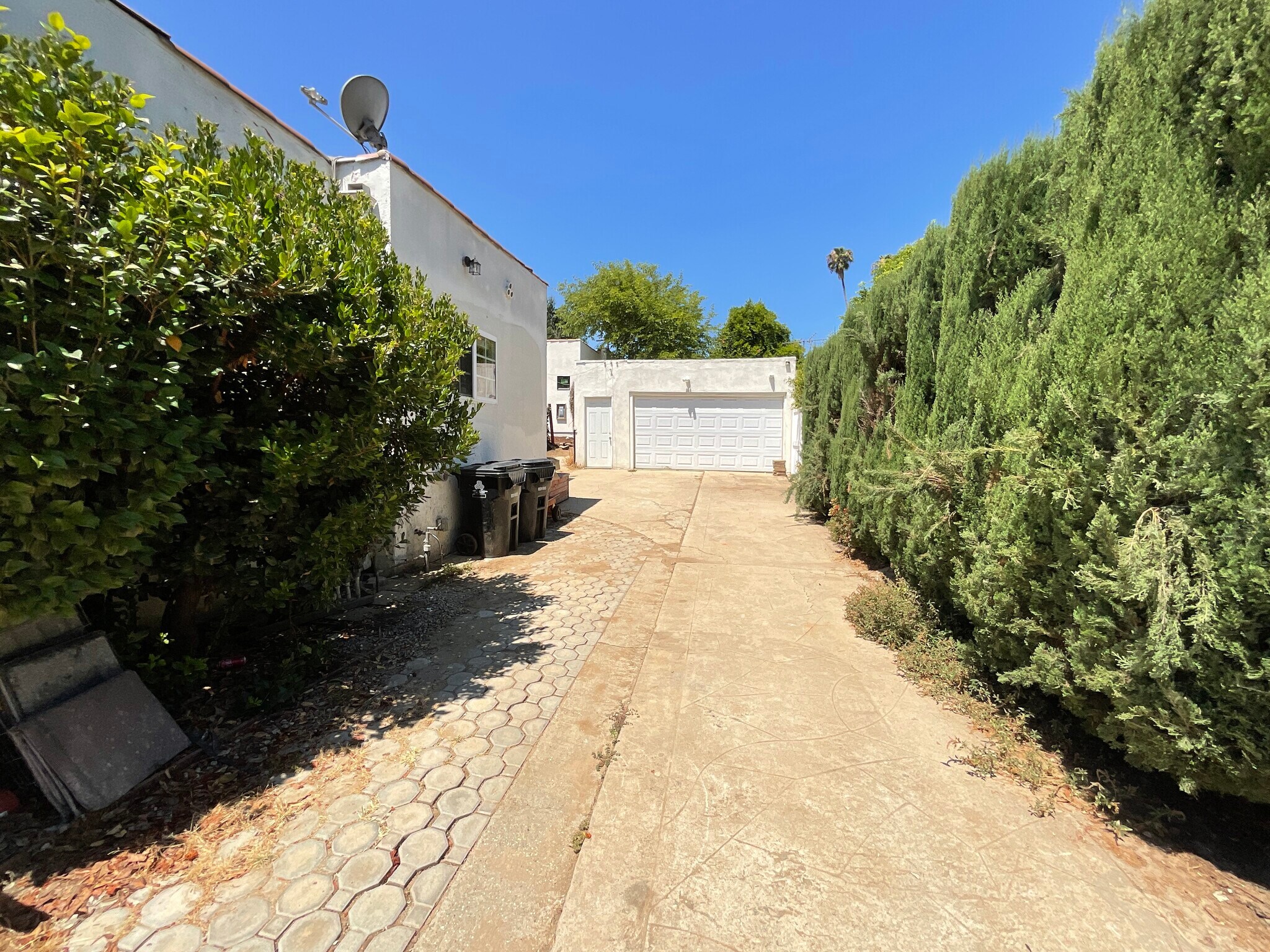 2 parking spaces in front of garage, with unit in the rear off-street - 3015 Warwick Ave