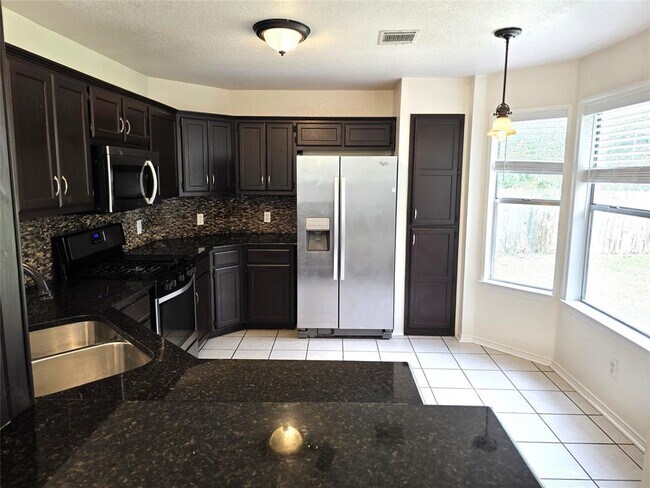 Building Photo - 1600 Hollow Tree Blvd