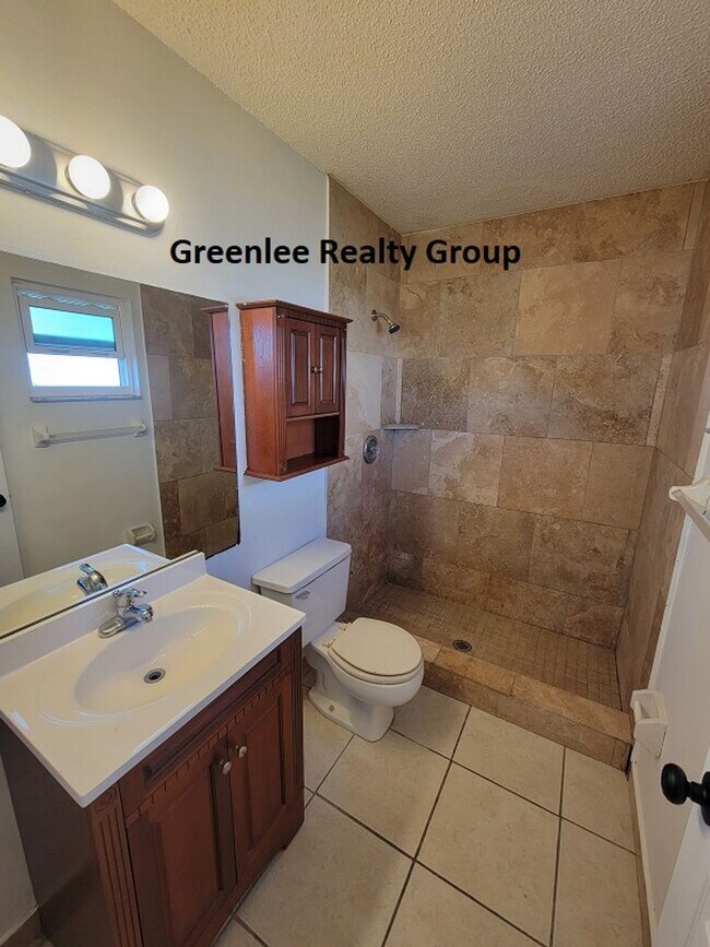 Building Photo - Relax by the water in this spacious 2-bedroom home with a 2-car garage, nestled in the highly des...