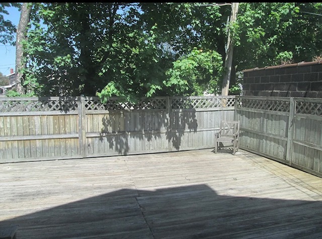 Shared back deck that leads to back entrance - 34 Canfield Pl