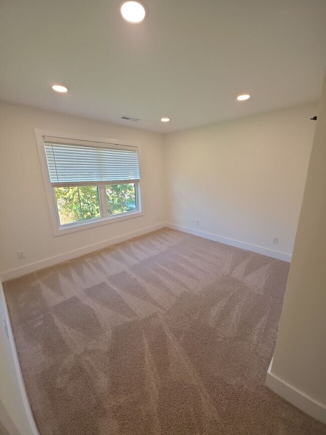 Building Photo - Brand-New 3-Bedroom Home with 2-Car Garage and Maintenance-Free Living