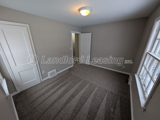 Building Photo - Well-Maintained Cape Cod with Garage on Corner Lot