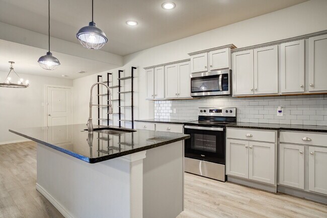 Building Photo - MOVE IN SPECIAL Recently built luxury town...