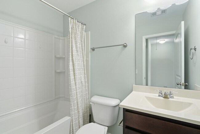 Building Photo - Charming 3 Bedroom Townhome with Private Patio & Fenced Backyard