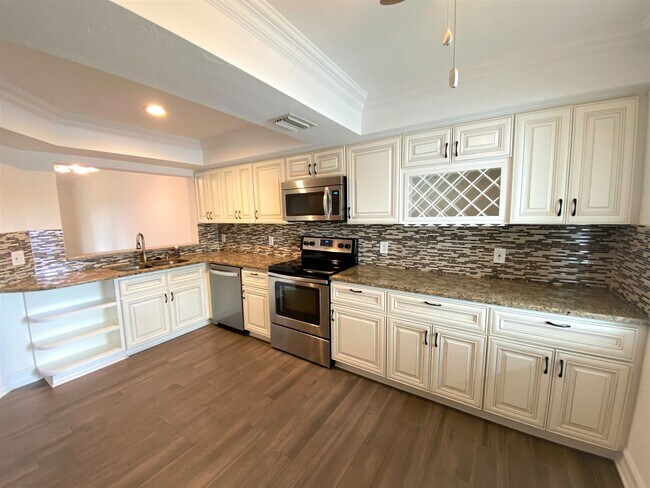 Building Photo - ** REGENCY WOODS ** 3 BED / 2 BATH - CONDO - CARPORT - SOUTH NAPLES - ANNUAL RENTAL