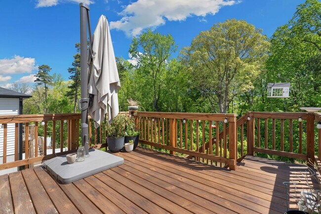 Building Photo - Move-In Ready 4BR Home | Deck, Patio & Open Concept Living