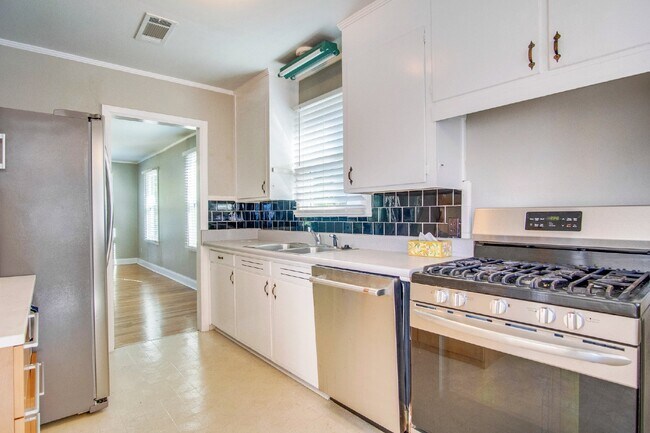 Building Photo - 3-Bedroom, 1-Bathroom Cottage in East Hill with Solar Power & Wraparound Deck!