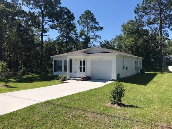 Building Photo - Cute Home Ready for Family