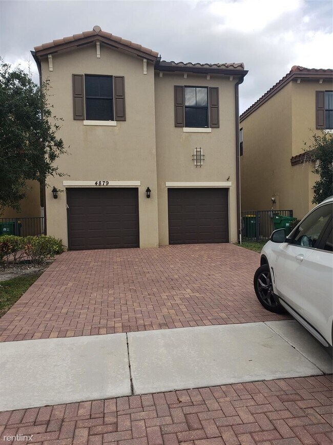 Building Photo - 4 br, 3 bath House - 4879 NW 55th Pl