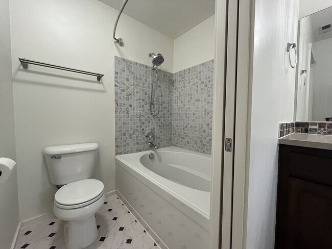 Building Photo - Beautiful 2 Bedroom Townhome with Walk-In Closets Private Deck & Attached Garage