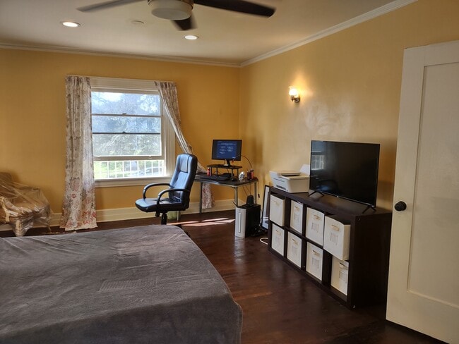 one of the large bedrooms upstairs. House can come furnished or unfurnished. - 2142 S Victoria Ave