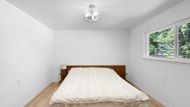 Building Photo - Light-Filled Home with Beautiful Garden & 2-Car Garage