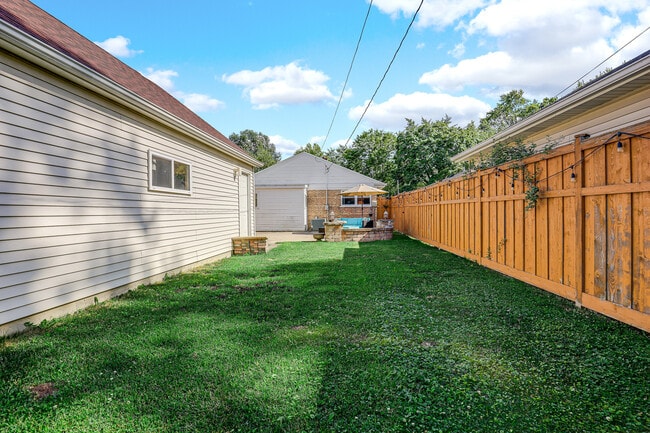 Building Photo - 6310 W Estes Ave