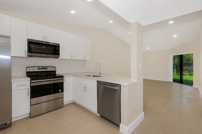 Primary Photo - Fully Renovated Corner 1/1 “Villa” with Ba...