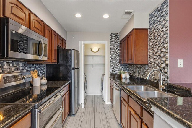 Building Photo - $1,500/mo – 2BR/1BA Condo in Northwest Austin with Stone Fireplace & Balcony