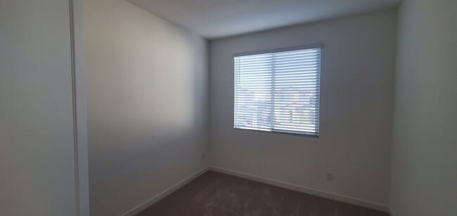 Building Photo - Beautifully designed modern townhome with attached garage.