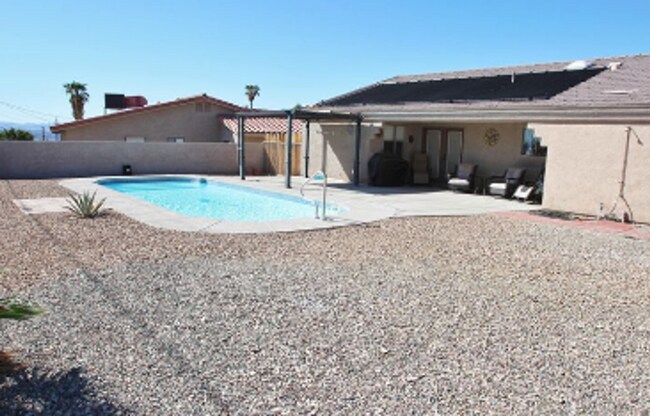 Building Photo - Furnished 3 Bedroom - 2 Bath Pool Home