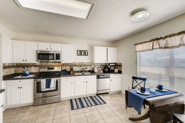 Building Photo - BEAUTIFUL HOME  |  OPEN CONCEPT  |  3 LIVING AREAS  |  FURNISHED OPTION  |  NEAR SCHOOLS & SHOPPING