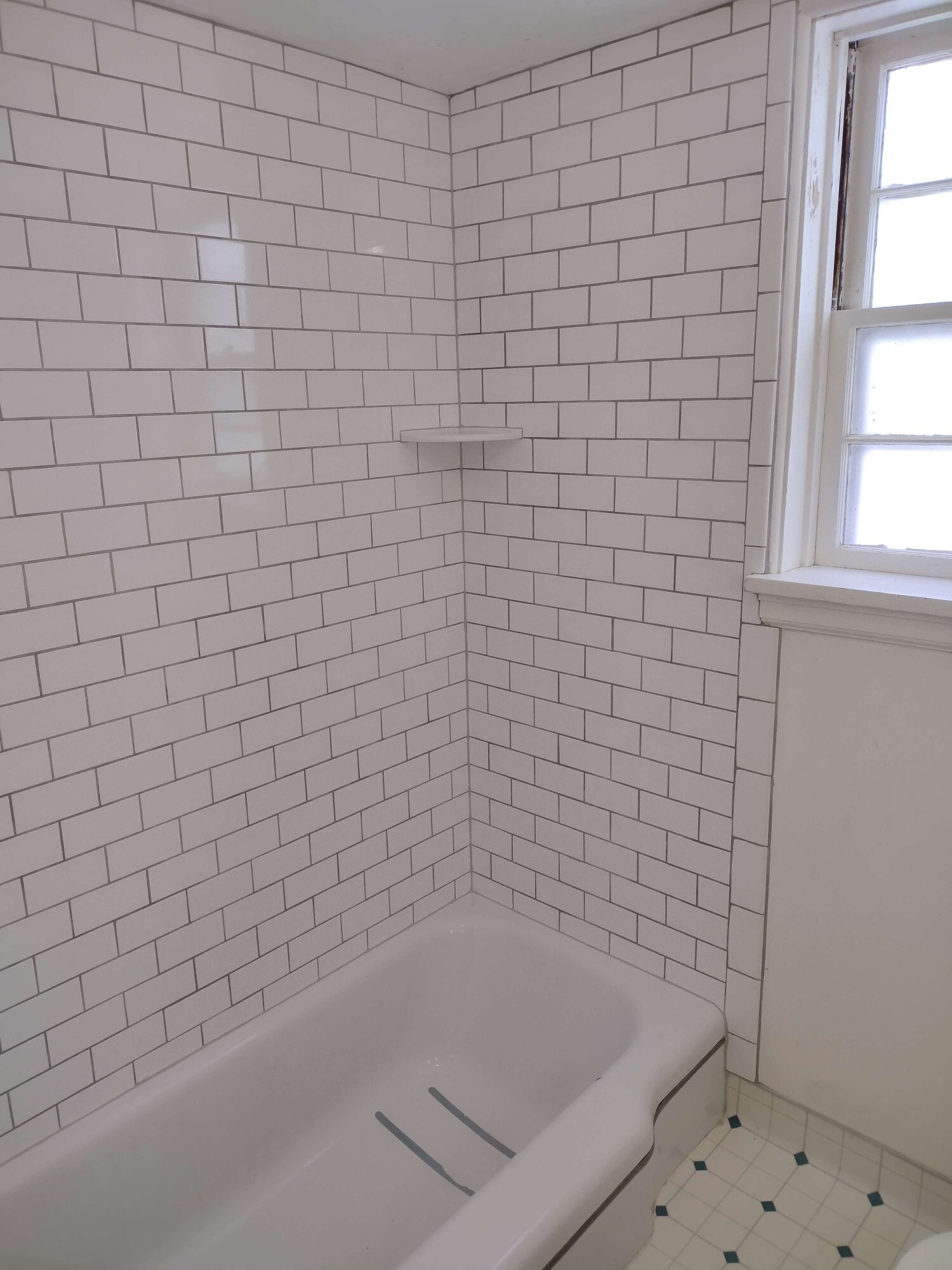 New subway tile in the bath - 901 Country Club Ave