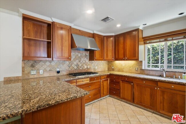 Building Photo - 4385 Camellia Ave