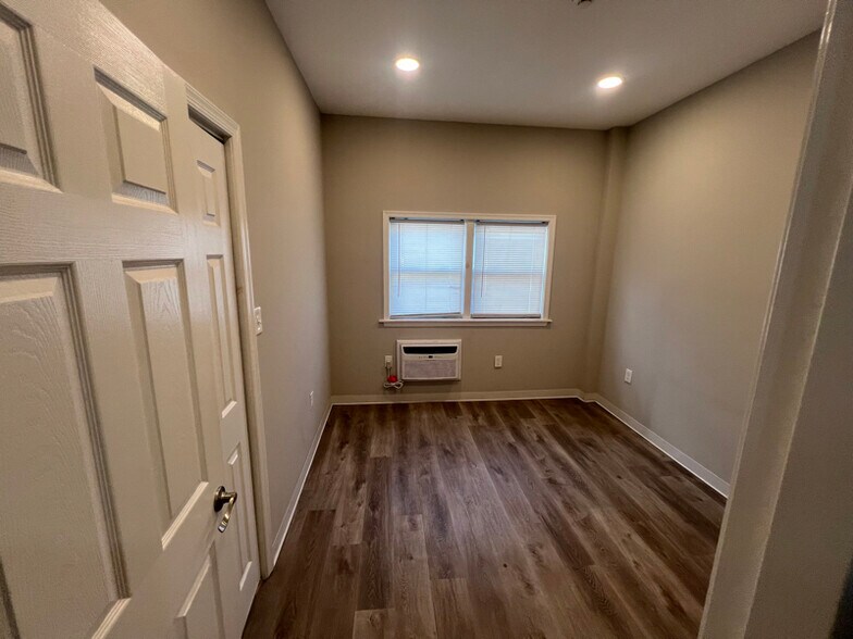 Building Photo - 7038 Woodland Ave