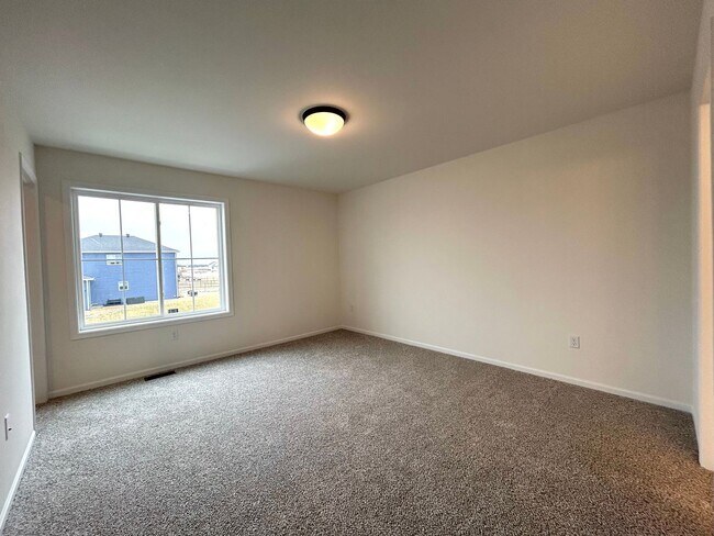 Building Photo - Spacious & Stylish 3-Bed Home with Modern Finishes and Attached 2-Stall Garage