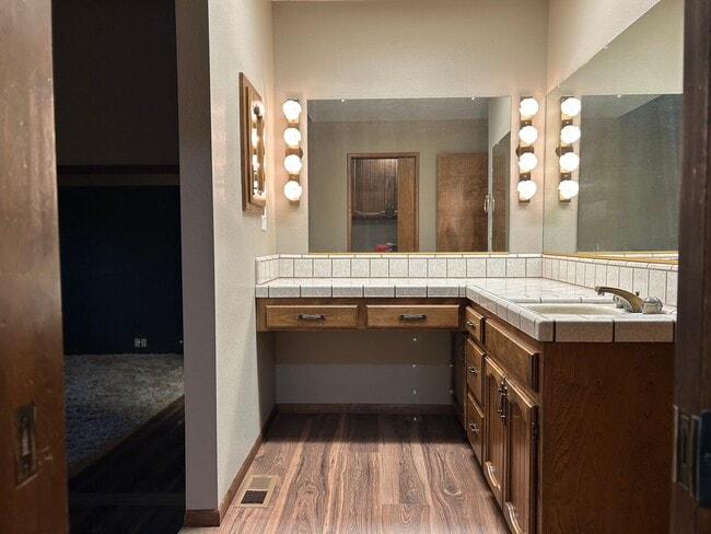 Building Photo - 6367 Woodman Dr