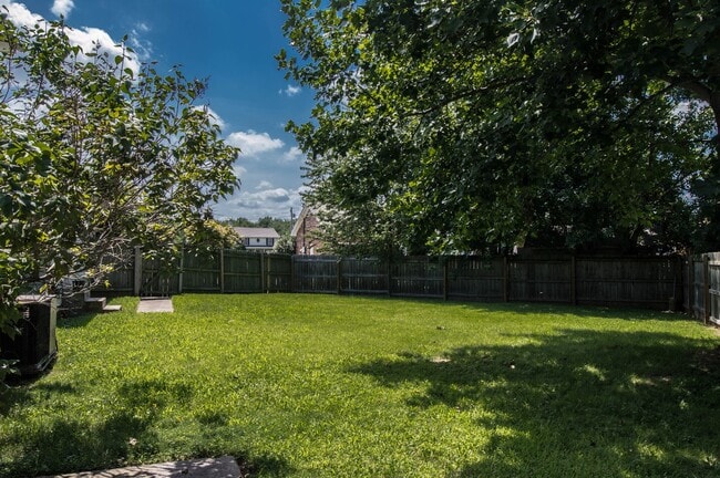 Building Photo - Dog Friendly Two Story with Fenced Yard!