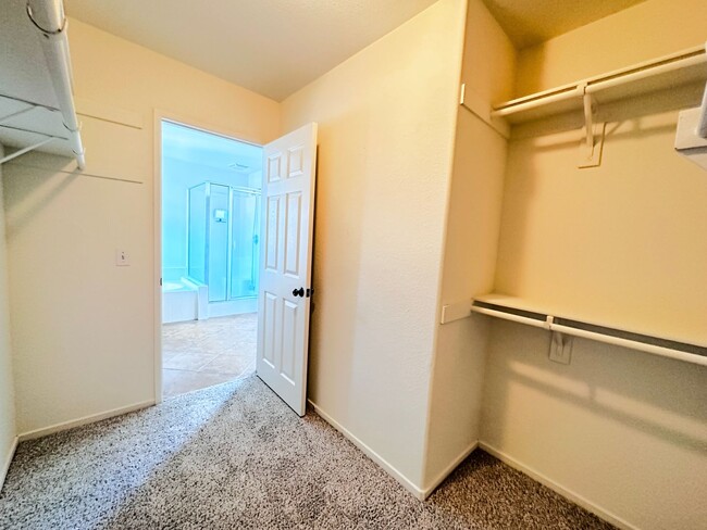 Building Photo - 4 bedroom home. New Carpet!