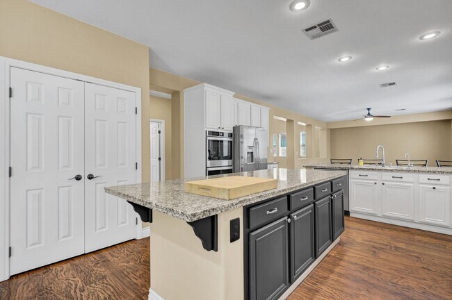 Building Photo - A Fabulous 4 Bedroom Home with a Sparkling...