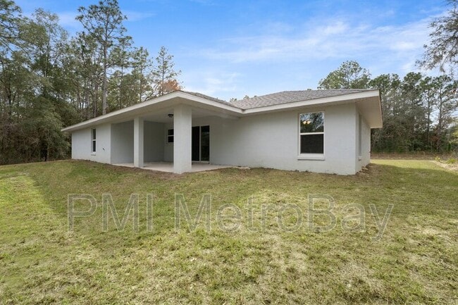 Building Photo - 9461 N Sandree Dr