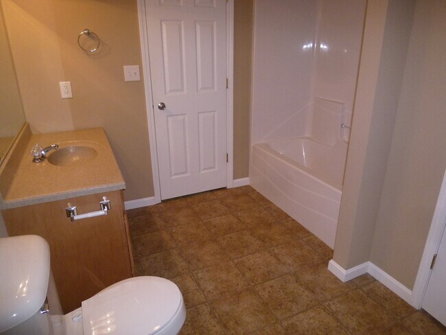 Building Photo - Spacious East Side 4 Bed 2 Bath Home, 2-Car Garage, Total Electric, Pets Welcome!