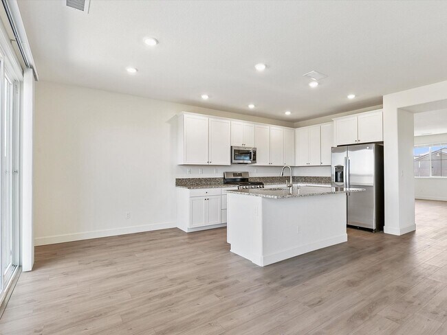 Building Photo - The Cypress - Large and Luxurious 2 Story with 4 Bedrooms, 3 Car Tandem Garage and fully fenced y...