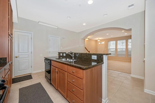 Building Photo - Desirable Two Level Condo For Lease - Not Pet Friendly