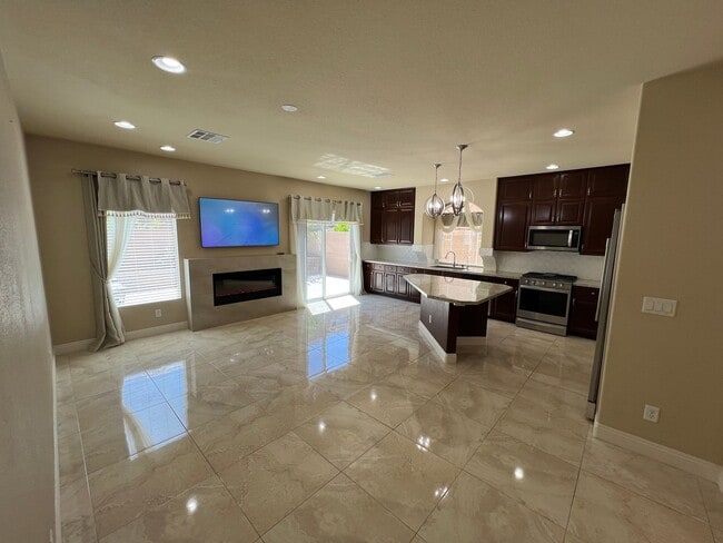 Building Photo - A Fantastic 4 Bedroom Home with the primary Downstairs, in Silverado Ranch