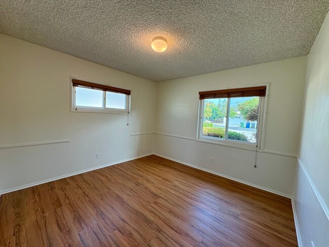 Building Photo - Charming 4-Bedroom Home on a Quiet Tree-Li...