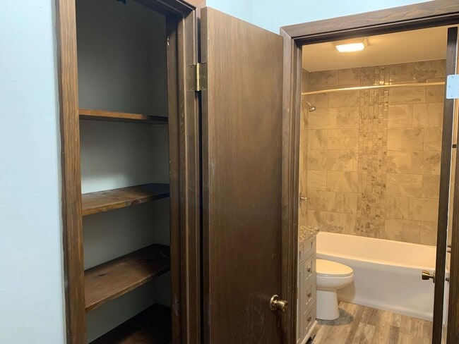 Building Photo - Updated 2BR/1.5BA with garage, lawn care included