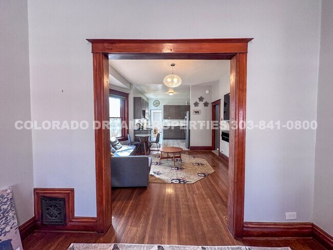 Building Photo - A home where old-world charm meets modern sophistication!