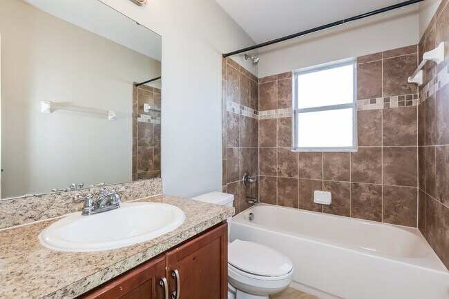 Building Photo - 6400 Twin Bridges Dr