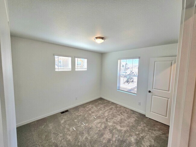 Building Photo - Paired Home in Dove Village: Spire 2 Story 3 Bed, 2.5 Bath Home with Upgrades