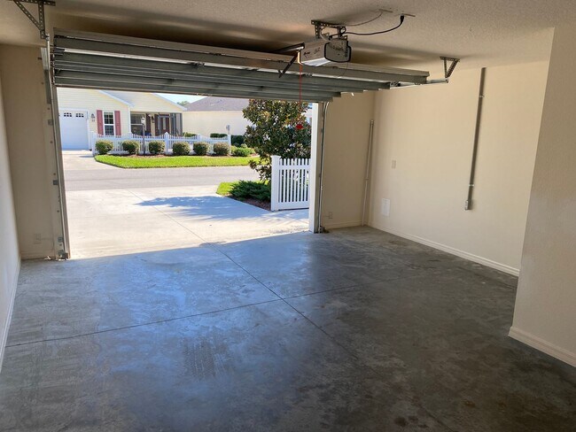 Building Photo - Resort Living in This UNFURNISHED Annual Rental in The Village of Fenny, Patio Villa, 2 bed, 2 bath.