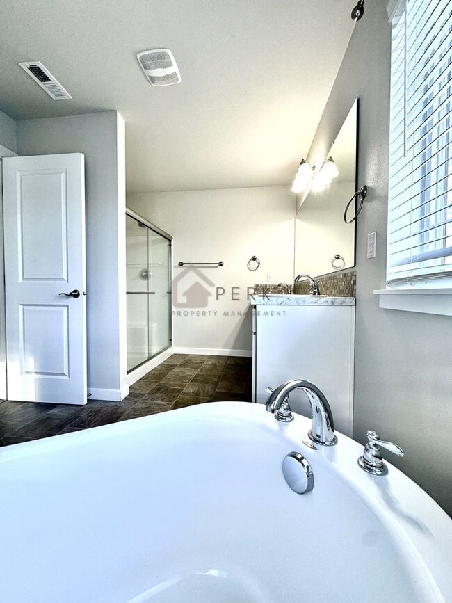 Building Photo - Modern 4-Bedroom, 2.5-Bath, 3-Story Home in Gated South Hill Community