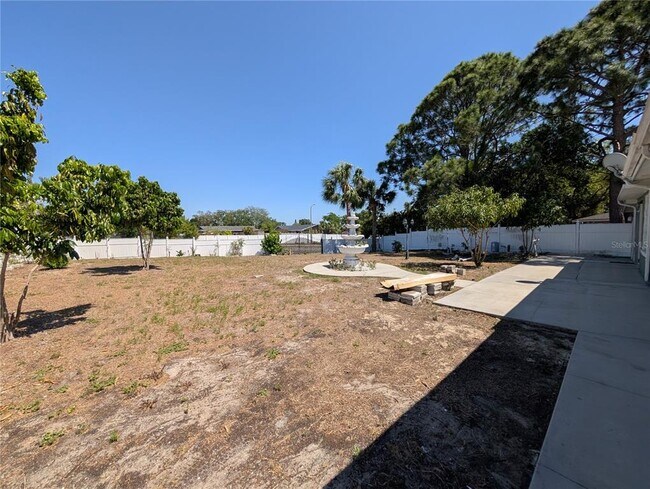 Building Photo - 6947 Bottle Brush Dr