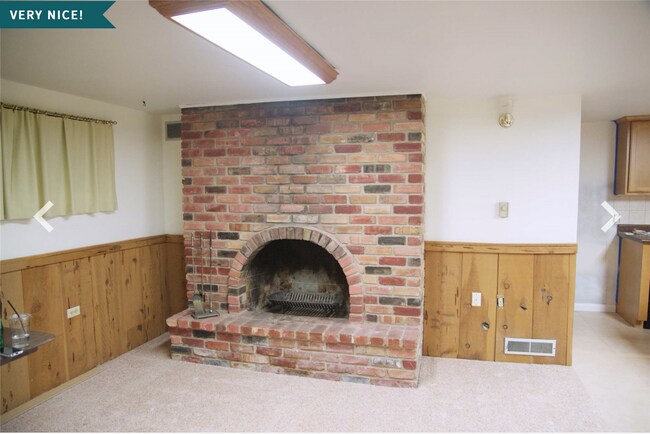 Family Room and Fireplace (wood paneling is now removed) - 5509 W 13600 N